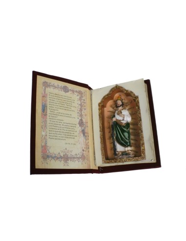 San Judas Tadeo dans un livre avec des couvertures en vinyle de velours et une figure peinte à la main à l'intérieur.