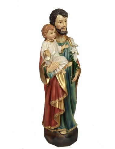 Sculpture religieuse Saint Joseph avec l'Enfant Jésus dans ses bras et des fleurs à la main. Mesures : 31 cm.