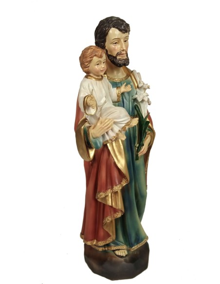 Escultura religiosa San José con Niño Jesús en brazos y flores en la mano. Medidas: 31 cm.