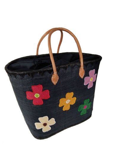 Panier de courses en raphia noir avec détail floral et poignée en cuir.