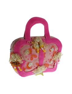 Bolso de mano infantil niña color rosa adornado con muñequitas