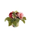 Flor artificial en test amb roses de color rosa i pètals de tela decoració per a la llar