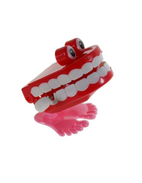 Juguete de cuerda para niños juego infantil con forma de dientes saltarines con ojos color rojo. Medidas: 6x4x5cm.
