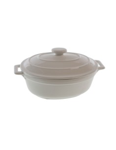 Mini cocotte ovale en céramique blanche avec couvercle et poignées pour service de table et ustensiles de cuisine.